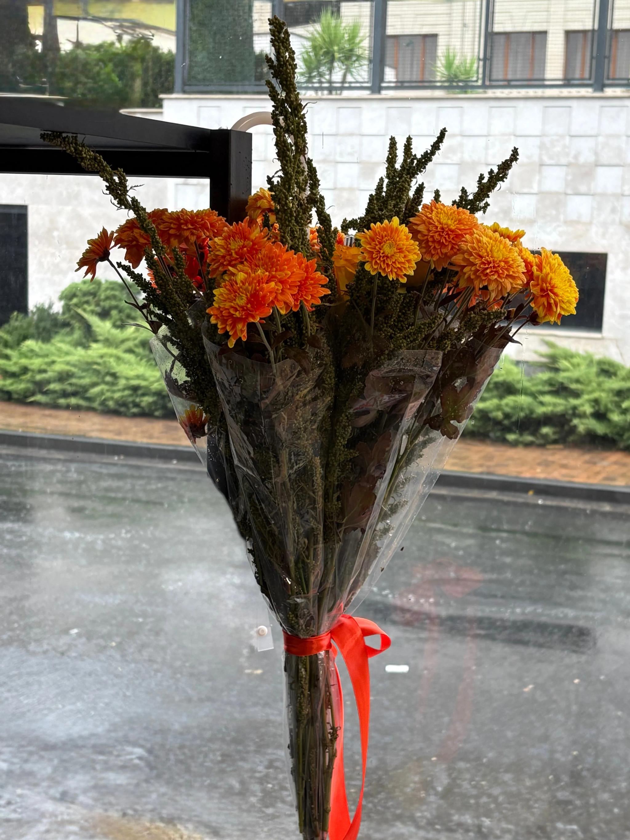 A bouquet of flowers in a raincoat | ծաղիկներ, ծաղկեպսակներ, բույսեր Երևան A bouquet of flowers in a raincoat | ծաղիկներ, ծաղկեպսակներ, բույսեր Երևան