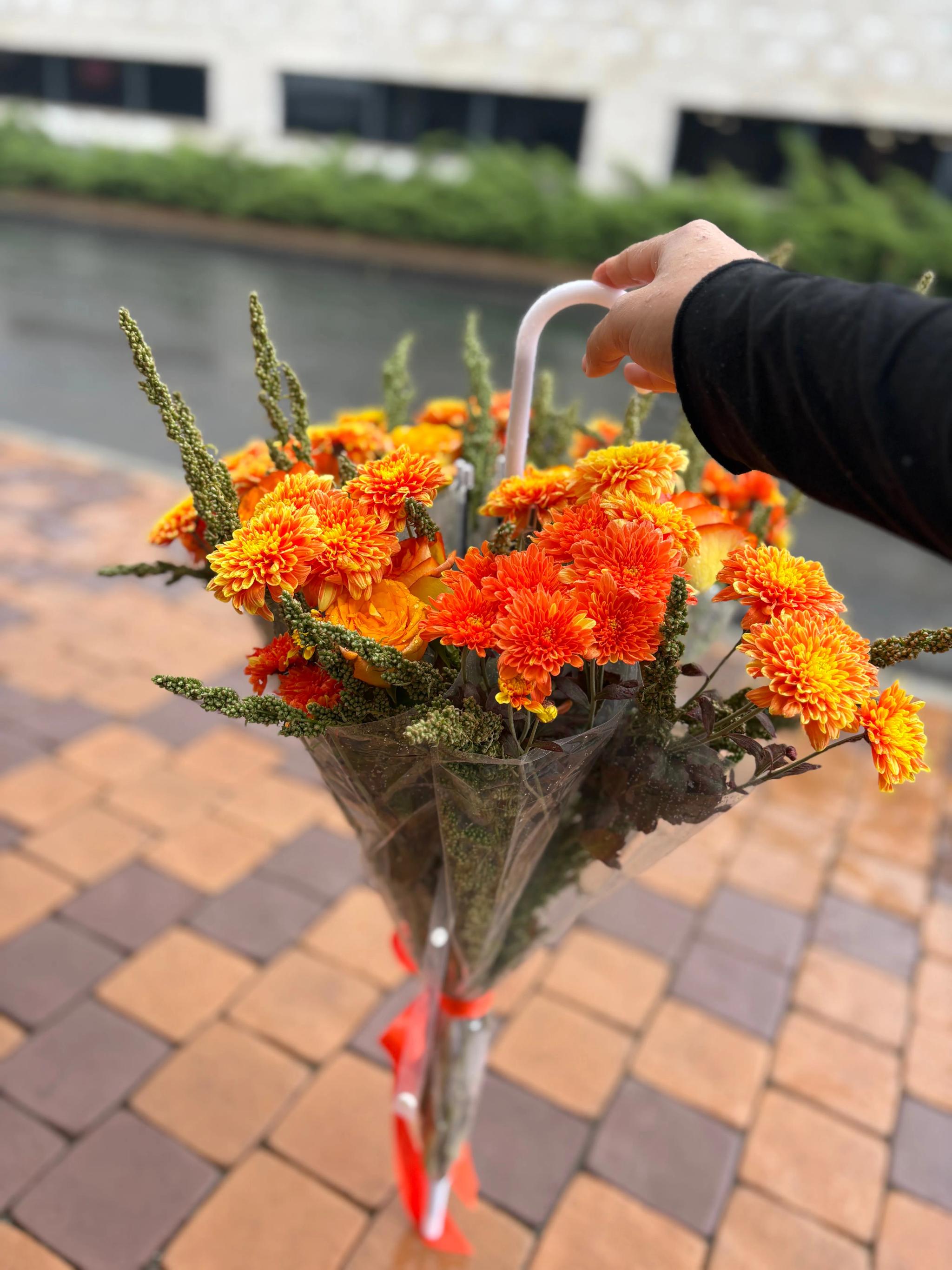 A bouquet of flowers in a raincoat | ծաղիկներ, ծաղկեպսակներ, բույսեր Երևան A bouquet of flowers in a raincoat | ծաղիկներ, ծաղկեպսակներ, բույսեր Երևան